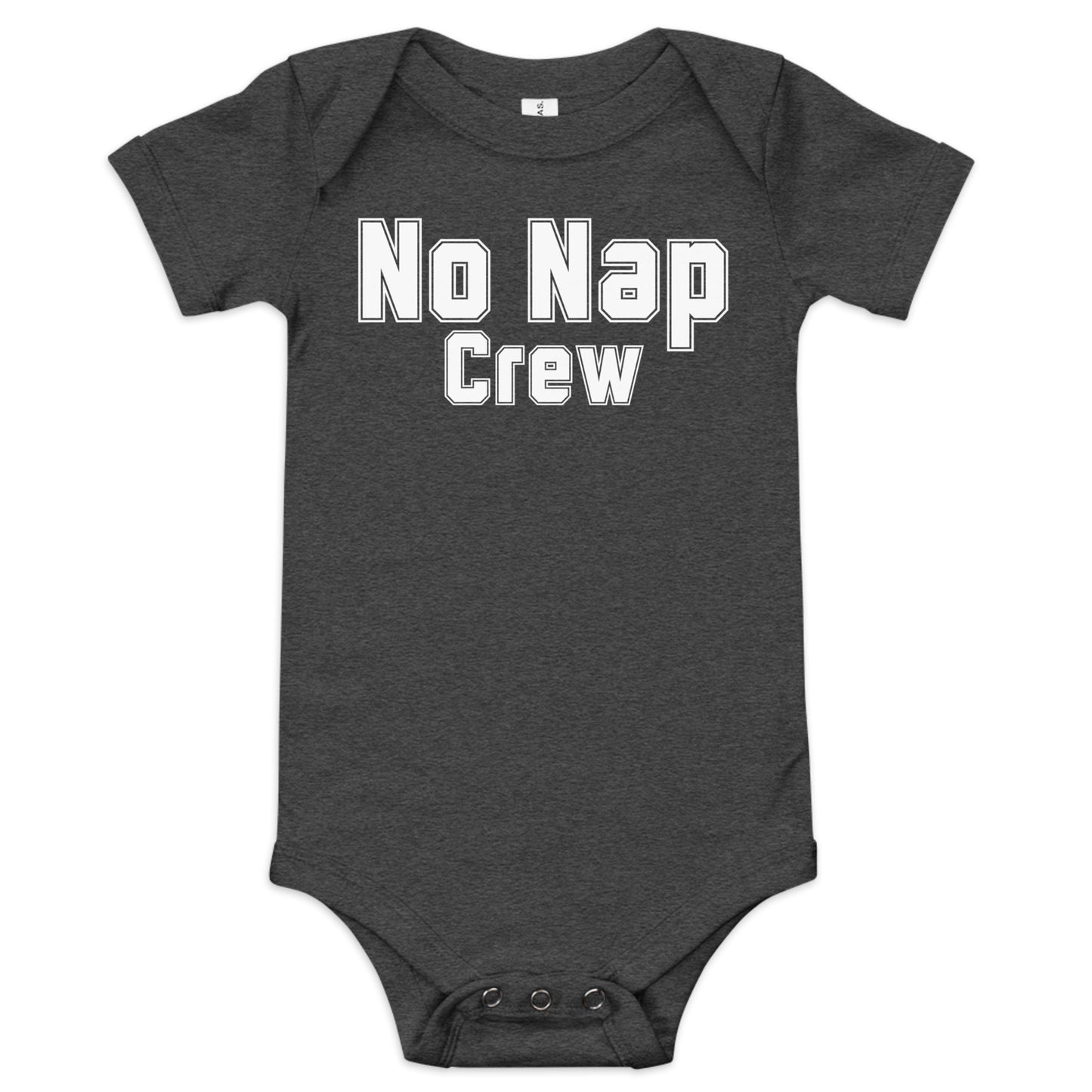 Baby wearing a “No Nap Crew” onesie in neutral tones, smiling and playful